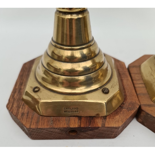 319 - Pair of Victorian Brass Candlesticks Converted to Lamps Mounted on Wooden Plinths. Each Measures 15 ... 