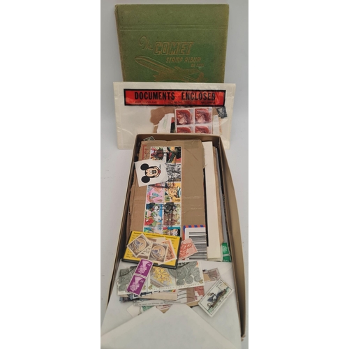 121 - Comet Stamp Album and box of Loose Stamps. Shipping is available. Please ask for a quote before bidd... 