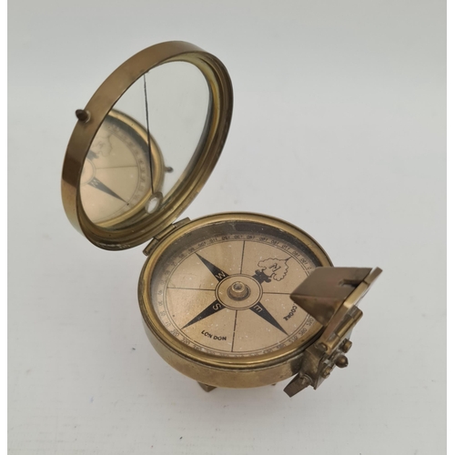 147 - Antiques Brass T Cooke London Compass. 20th Century. Measures 2.5 inches tall. Shipping is available... 