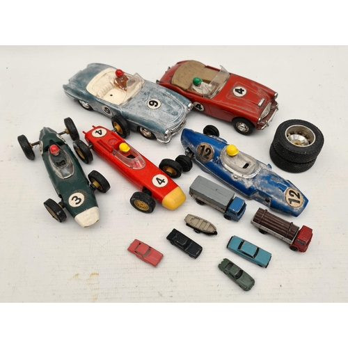 392 - Assorted Toy Cars. Includes Triang Scalextric Shipping is available. Please ask for a quote before b... 