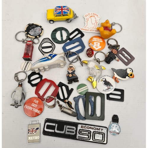 394 - Assorted Novelty Keyrings Badges and Buckles Plus Vintage Car Badge and Car Related Fobs. Shipping i... 