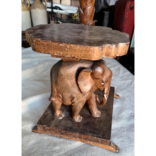 188 - Vintage Hand Carved Hard Wood Elephant Lamp Stand. Measures 12 inches square at the base by 5 feet t... 