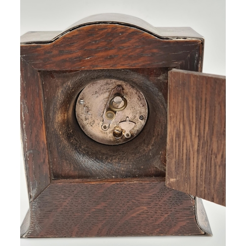 221 - Sterling Silver on Oak Wood Frame Mantel Clock Swiss Movement. Measures 13cm tall by 5cm deep and 12... 