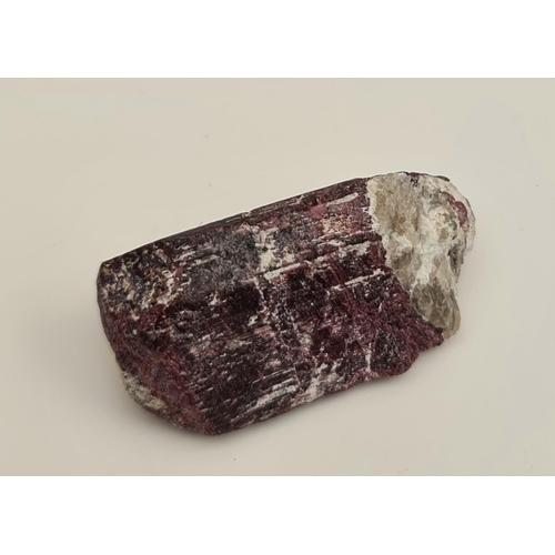 293 - Collectable Mineral Rubellite Tourmaline Weight 34g. Measures 4.5cm by 2.5cm. Shipping is available.... 