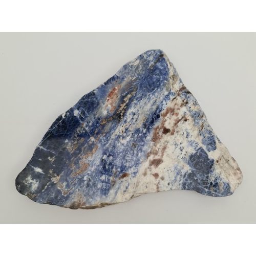 312 - Collectable Rocks and Minerals. Sodalite Slice Weight 609g Measures 7 inches by 6 inches by 0.75 inc... 