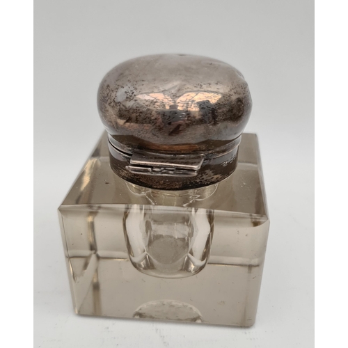 323 - Sterling Silver Topped Ink Well. Square Glass Body. London 1933. Measures 9cm tall. Hing requires a ... 