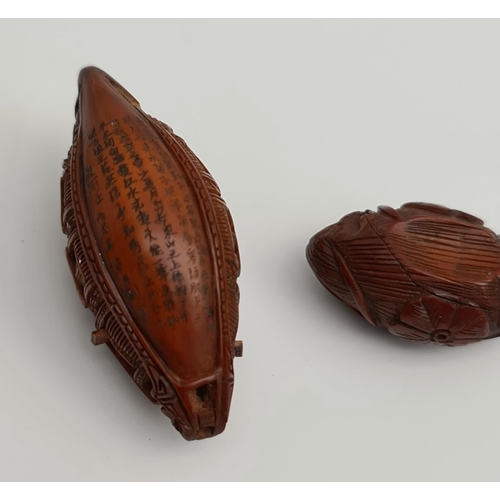 369 - 2 x Oriental Carved Nuts With Miniature Scenes. Includes Boat with carved figures and Oriental Scrip... 