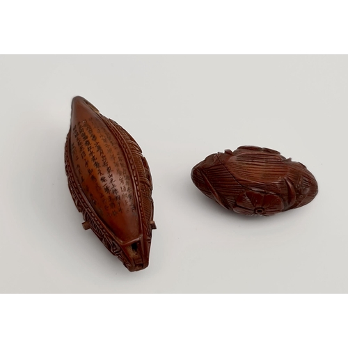 369 - 2 x Oriental Carved Nuts With Miniature Scenes. Includes Boat with carved figures and Oriental Scrip... 