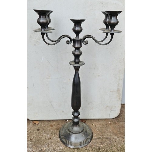 392 - Large Cast Metal 4 Brach Candlestick. Measures 82cm tall. Shipping is available. Please ask for a qu... 