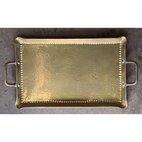 42 - Brass Arts and Crafts Style Tray. Measures 49cm long and 28cm wide.  Shipping is available. Please a... 