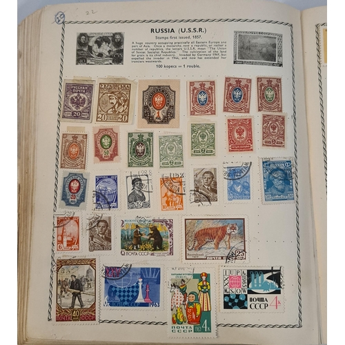 145 - The Triumph Stamp Album With Approximately 1800 World Stamps. Includes various Commonwealth Victoria... 