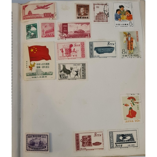 145 - The Triumph Stamp Album With Approximately 1800 World Stamps. Includes various Commonwealth Victoria... 