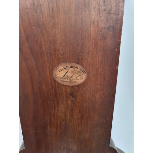 194 - Victorian Large Mahogany Cased Aneroid Barometer. Carved Panels and Pediment. Measures 41 inches by ... 