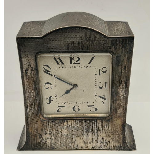 197 - Sterling Silver on Oak Wood Frame Mantel Clock Swiss Movement. Measures 13cm tall by 5cm deep and 12... 