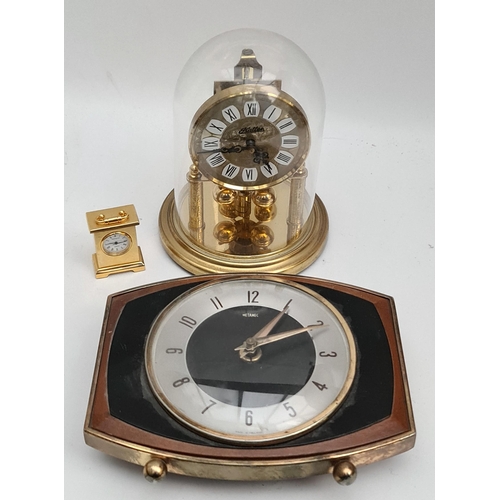 198 - Vintage Haller Torsion Clock Under Glass Dome Plus Vintage Metamec Mantel Clock and One Other. The H... 