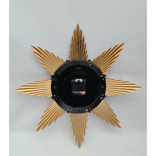 203 - Vintage Metemec Sunburst Wall Clock c1950's. White face, brass sunbursts with brass white enamelled ... 