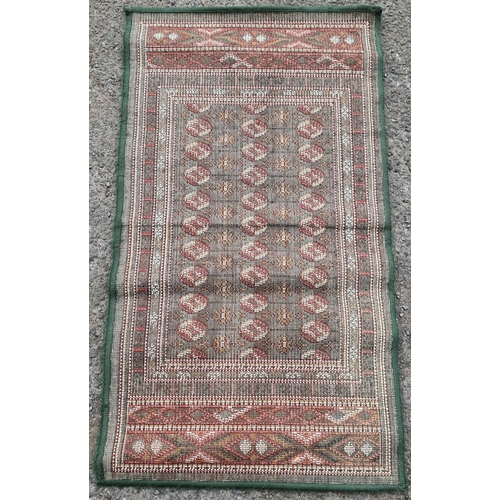 204 - Vintage Green Coloured Rug or Runner. Measures 24 inches by 41 inches. Shipping is available. Please... 