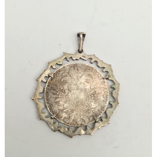 281 - Silver Austrian Thaler Coin Mounted in .800 Silver Pendant. The coin is held in place by 4 claws and... 