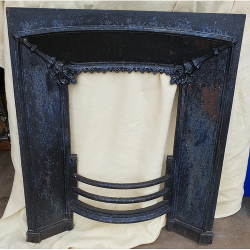 357 - Antique Victorian Cast Iron Fire Surround. Measures 34 inches tall by 29 inches wide. Shipping is av... 