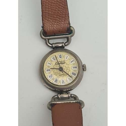 374 - Must de Cartier Ladies Quartz Wrist Watch. Roman numerals hour minute and second hand. Yellow and wh... 