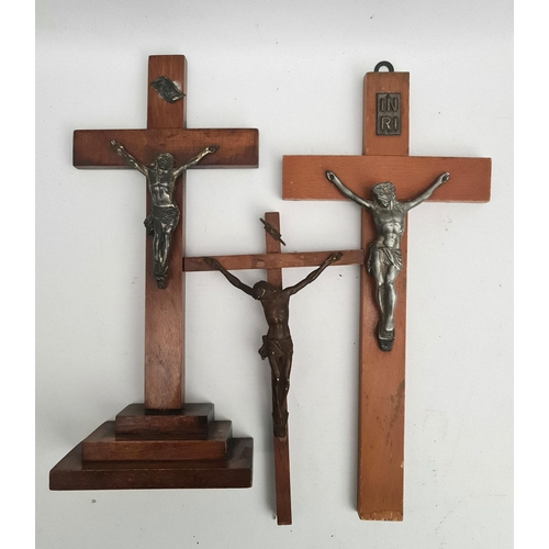 386 - Three Vintage Crucifix. Two are wall mounted the third is on a stand. The tallest measures 12 inches... 