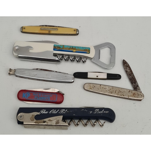 390 - Parcel of 7 Assorted Penknives. Includes Bone Handles, Brewery Related and KP Nuts. Shipping is avai... 