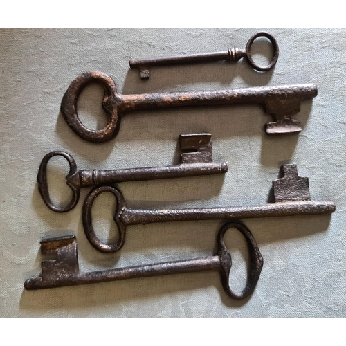 396 - Parcel of 5 Antique and Vintage Iron Keys. The longest measures 6 inches long. Shipping is available... 