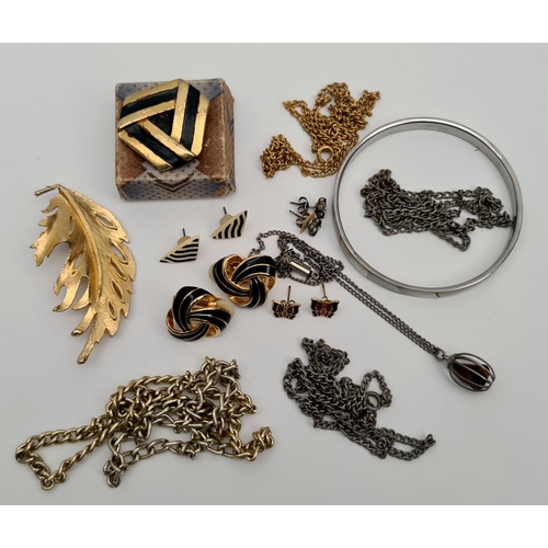 83 - Parcel of Vintage Costume Jewellery. Includes Earrings, Brooches, Chains etc. Shipping is available.... 