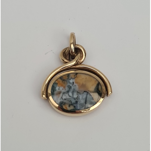 90 - 9ct Gold Swivel Pendant With Inlaid Agate and Dark Stone. Measures 2.5cm wide and total weight 8g. S... 