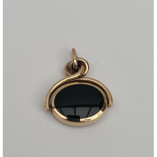 90 - 9ct Gold Swivel Pendant With Inlaid Agate and Dark Stone. Measures 2.5cm wide and total weight 8g. S... 