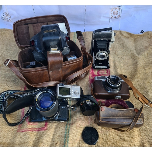 16 - Parcel of Vintage Cameras and Camera Equipment. Includes Motorola and Kodak. Shipping is available. ... 