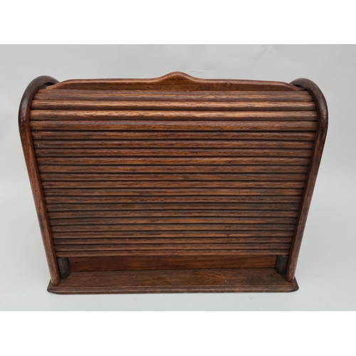 225 - Antique Oak Wood Roll Top Stationery Box. Measures 28cm by 17cm by 24cm tall. Shipping is available.... 