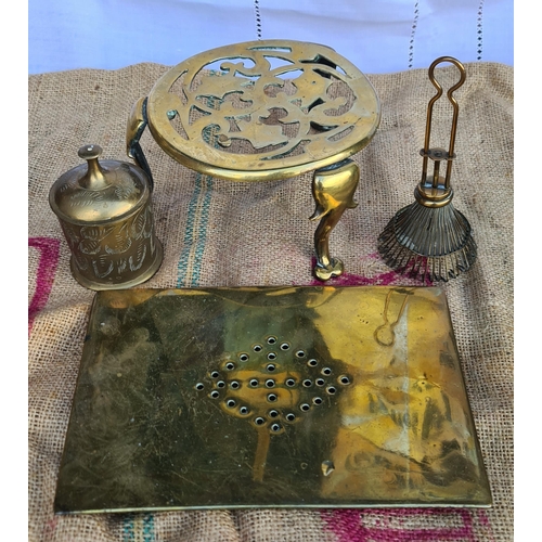 348 - Antique Brass Trivets and Other Vintage Brass Items. The oblong brass trivet measures 23cm by 15cm. ... 