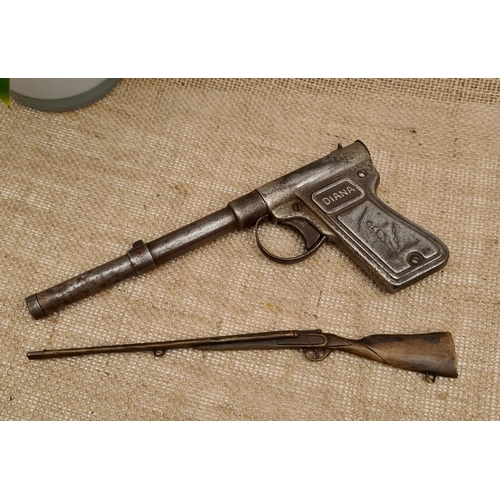 411 - Vintage c1930's Diana .177 cal Smoothbore Push-Barrel Steel Air Pistol and a Bronze Toy Model of A D... 