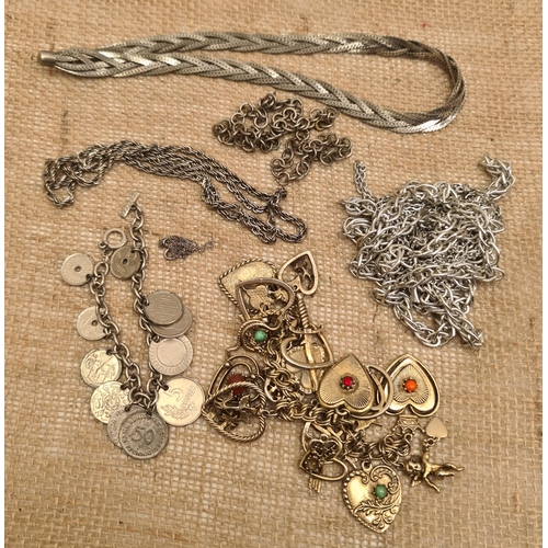 61 - Parcel of Silver coloured Costume Jewellery. Includes Charm Bracelet Chains and Necklaces. Shipping ... 