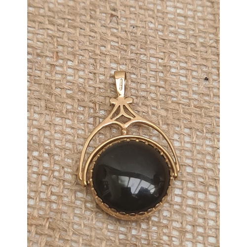 69 - 9ct Gold Swivel Pendant Total Weight 12g. Hallmarked Sheffield 1997 SJ Shipping is available. Please... 