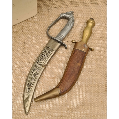 419 - Vintage Early 20th Century  2 x Middle East Ornamental Daggers. Both in Scabbards, one metal one woo... 