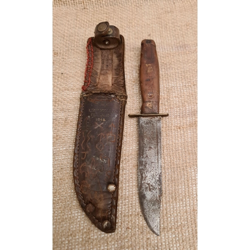 416 - Vintage 1946 Scouting Knife With Scabbard Beaudesert England. The knife measures 20cm long. Shipping... 