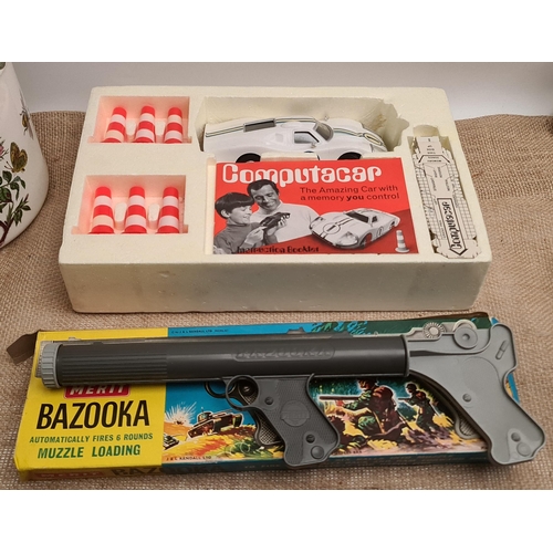 458 - Vintage 1966 Boxed Mettoy Computacar and Boxed Merit Bazooka.  Shipping is available. Please ask for... 