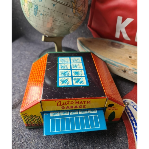 462 - Vintage Tin Plate Garage With Assorted Vintage Games, KLM Bag and Boat. Shipping is available. Pleas... 