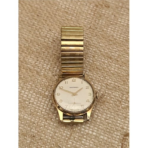 556 - Vintage 9ct Gold Garrard Mens Wrist Watch With Gold Plated Elasticated Strap Swiss Movement and 17 J... 