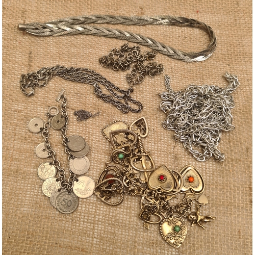 61 - Parcel of Silver coloured Costume Jewellery. Includes Charm Bracelet Chains and Necklaces. Shipping ... 