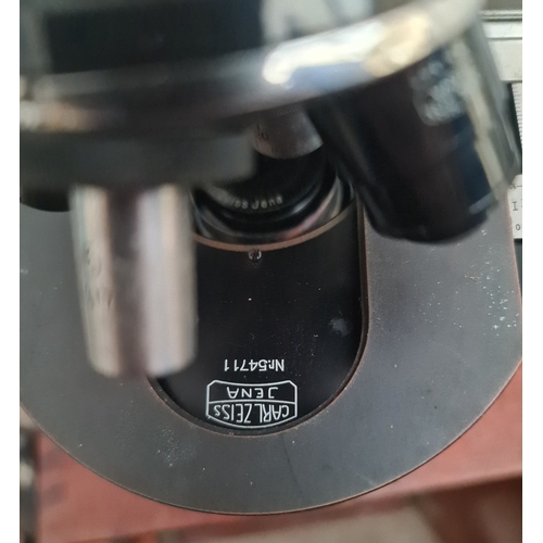 18 - Vintage 1950's Carl Zeiss Jena Microscope in Original Case Plus Various Lenses. Shipping is availabl... 