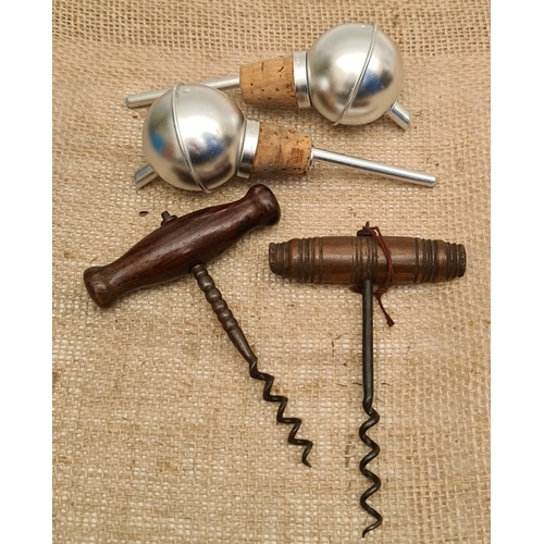 37 - Antique Corkscrews and Vintage Wine Pourers. Largest corkscrew measures 13cm long. Shipping is avail... 