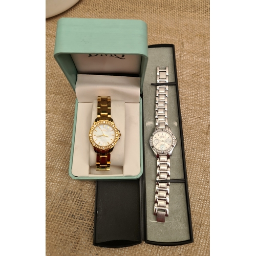 444 - Two Vintage DMQ Wrist Watches in Original Boxes. Shipping is available. Please ask for a quote befor... 