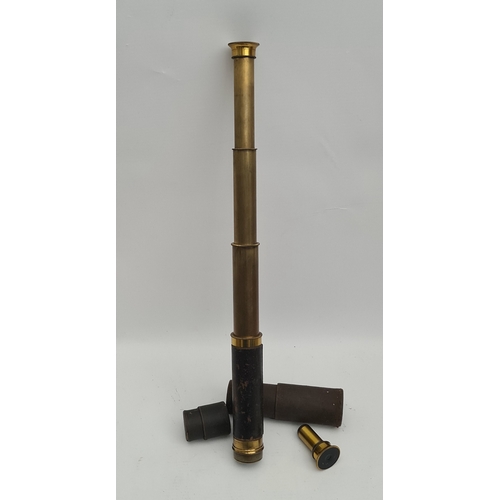 465 - Antique Brass Three Draw Telescope With Leather Grip. Unsigned 41cm when fully extended with a 3cm l... 
