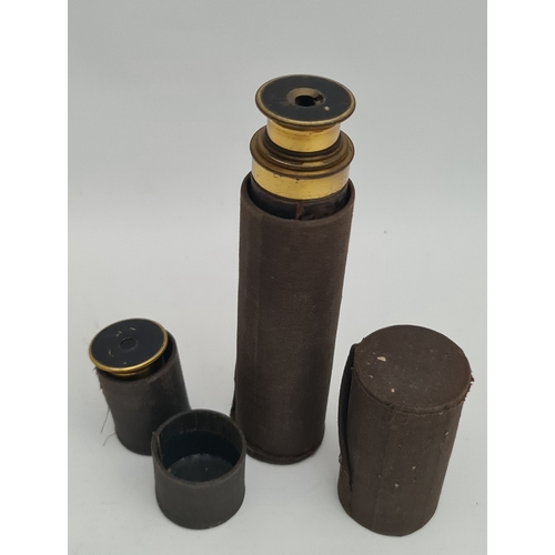 465 - Antique Brass Three Draw Telescope With Leather Grip. Unsigned 41cm when fully extended with a 3cm l... 