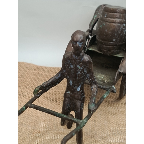 48 - Vintage Bronze Rough Cast Metal Oriental Sculpture Figure With Rickshaw. Measures 36cm by 20cm by 14... 