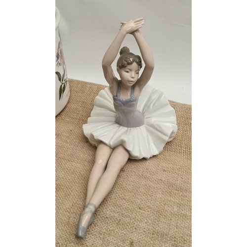 599 - Vintage Ceramic Nao Ballerina figure Seated number 1208. Measures 30cm long by 22cm tall. Shipping i... 