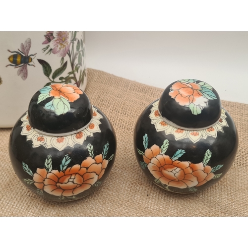8 - Antique Pair of Hand Painted Small Ginger Jars With Lids. Each measures 12cm tall. One has damage to... 